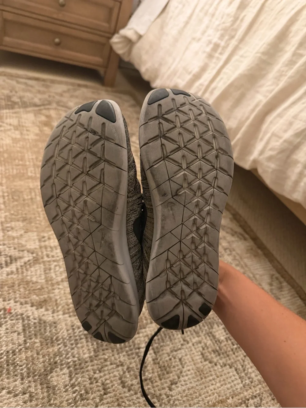 Nike Light Gray Flyknit Sneakers with Black Swoosh
